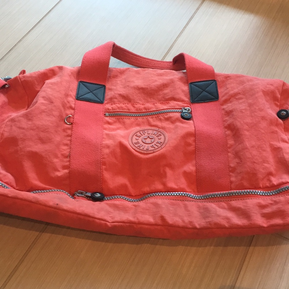 Hot pink Kipling overnight bag